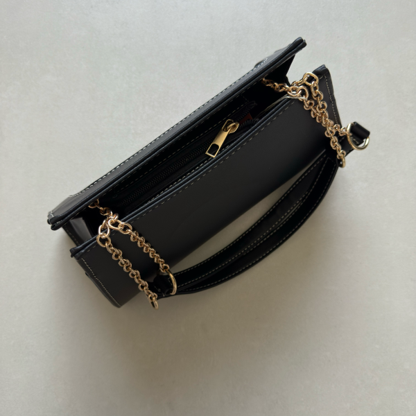 حقيبة لون أسود بنمط أحرف Monogram patterned black color handbag
