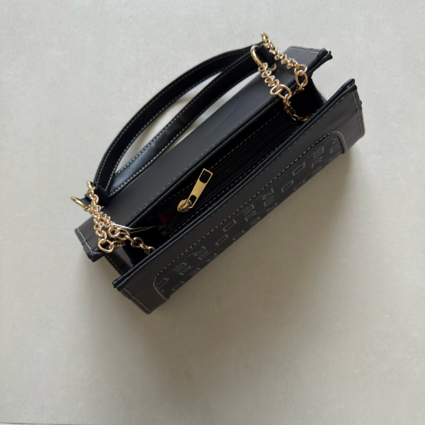 حقيبة لون أسود بنمط أحرف  Monogram patterned black color handbag