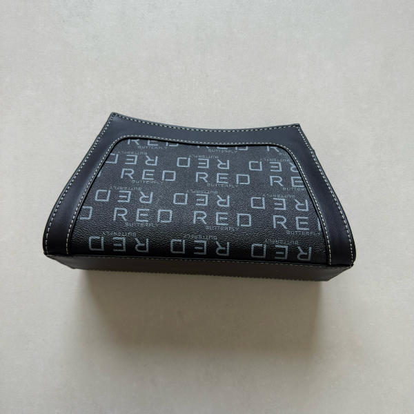 حقيبة لون أسود بنمط أحرف  Monogram patterned black color handbag